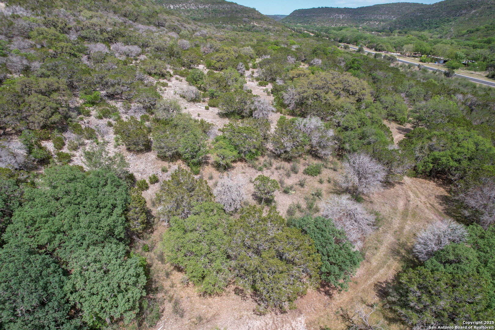 83 North U.S. Highway 83 Leakey, TX 78873 - Photo 18 of 19 a view of a mountain range with trees in the background