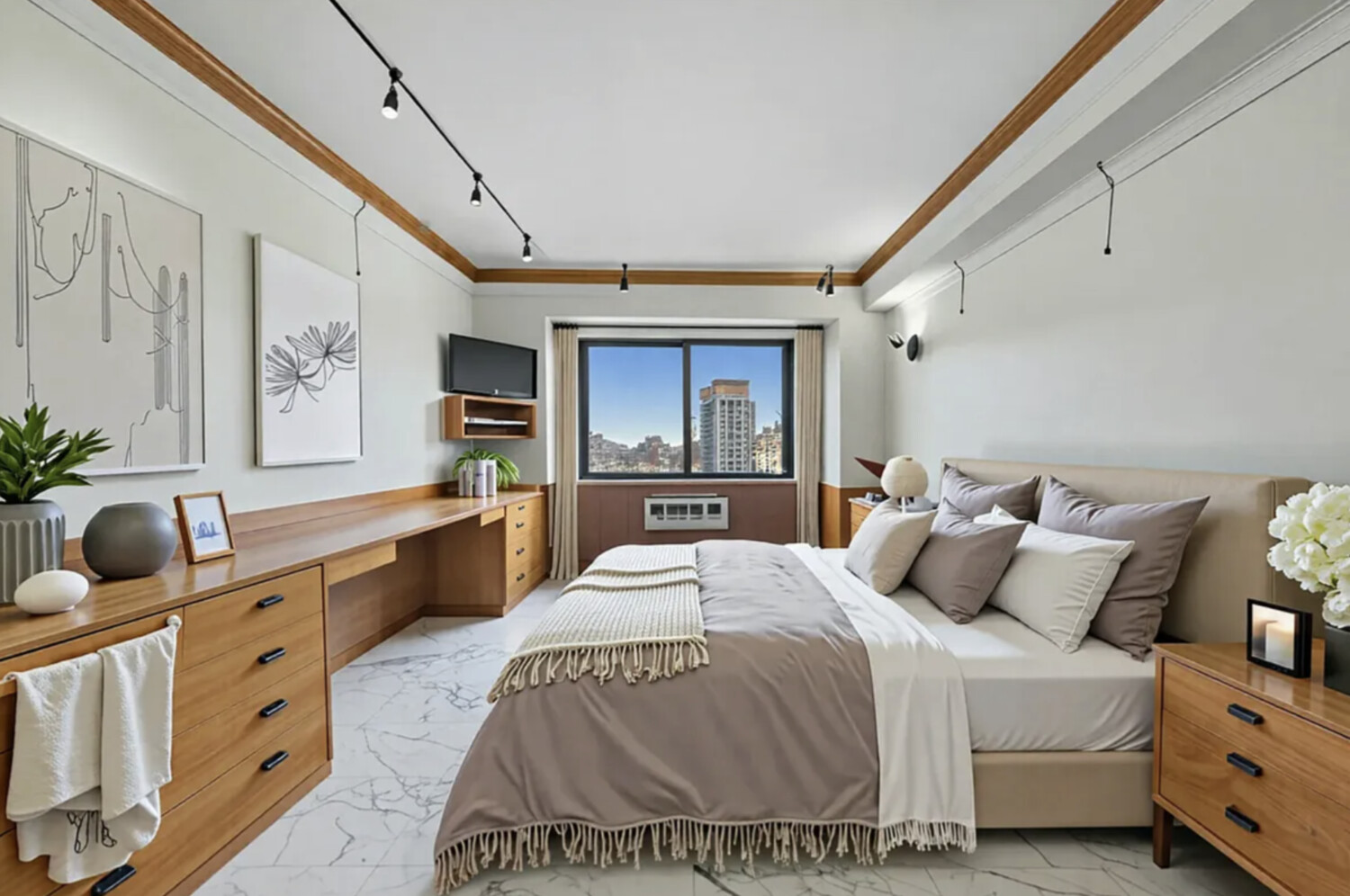 60 East End Avenue, Unit 27B Manhattan, NY 10028 - Photo 4 of 11 a bedroom with a bed and large windows