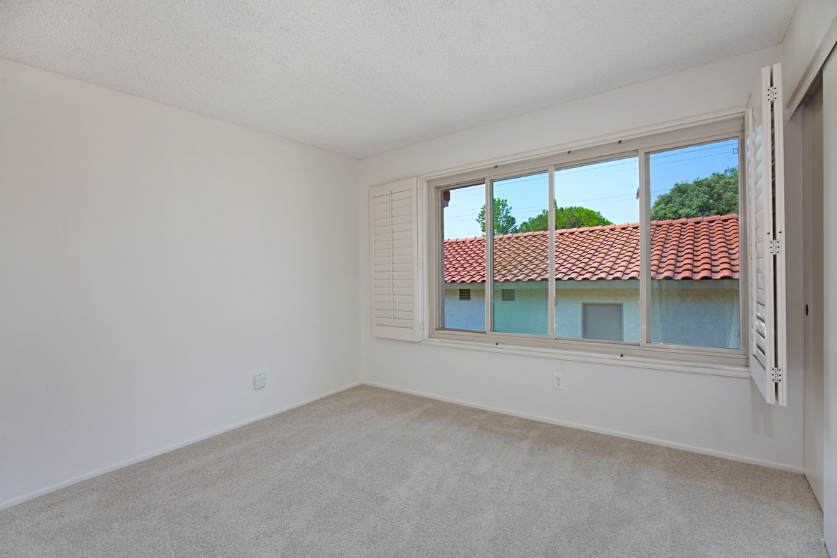 1982 Fairlee Drive Encinitas, CA 92024 - Photo 14 of 25 Guest bedroom faces and west and enjoys the coastal breezes.