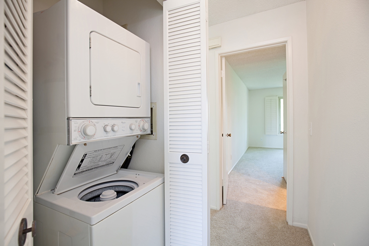 1982 Fairlee Drive Encinitas, CA 92024 - Photo 16 of 25 Efficient laundry in the hall.