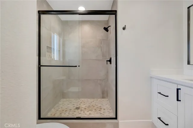 a view of a hallway with washer and dryer