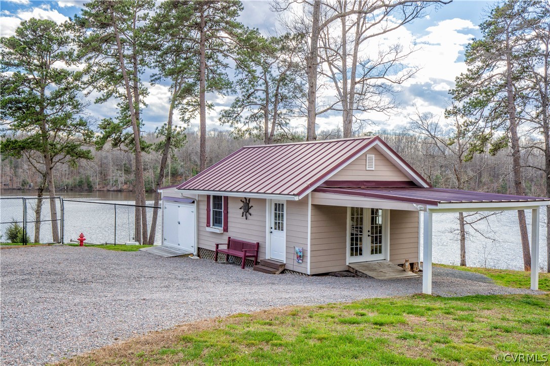11772 Colemans Lake Road Ford, VA 23850 - Photo 37 of 46 Workshop w/Storage Bay & New Carport