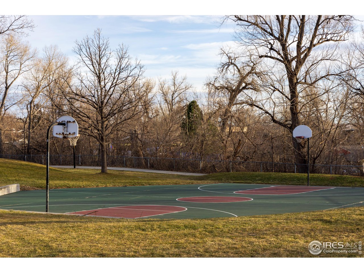 3295 34th Street, Unit 68 Boulder, CO 80301 - Photo 24 of 27 a view of a tennis ground