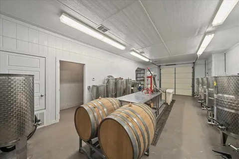 a bed room with a bed and a chair