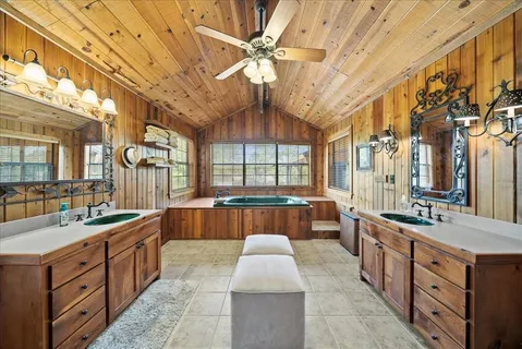 a large kitchen with a large window