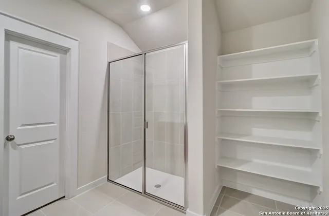 a view of an empty walk in closet