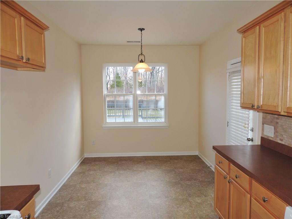 2124 Burton Run Road High Point, NC 27262 - Photo 12 of 29 Great breakfast area off the kitchen! Door leads to patio and tiered deck!