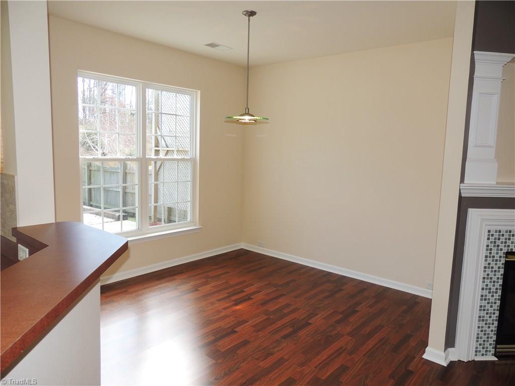2124 Burton Run Road High Point, NC 27262 - Photo 13 of 29 Dining room with double windows providing a great view of the back yard.