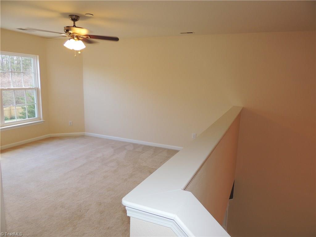 2124 Burton Run Road High Point, NC 27262 - Photo 18 of 29 Upstairs Loft! This space could be used in many different ways! Play area, office, game room, theater....the list goes on!