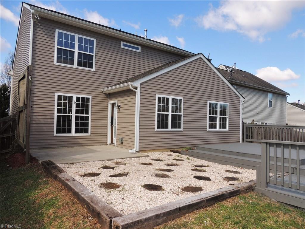2124 Burton Run Road High Point, NC 27262 - Photo 25 of 29 Great entertaining space! Patio and tiered deck off kitchen!