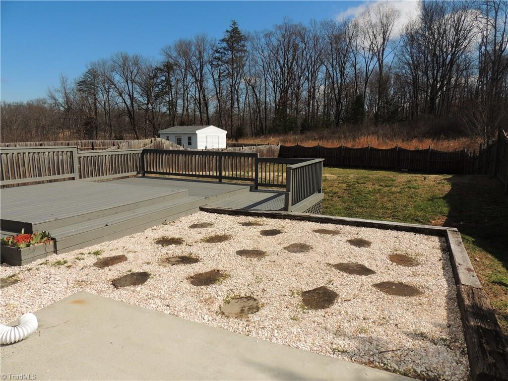 2124 Burton Run Road High Point, NC 27262 - Photo 26 of 29 Great view of the tiered deck and Privacy-fenced yard!