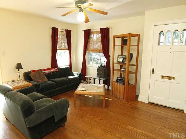 309 Cedar Street Raleigh, NC 27604 - Photo 4 of 25 Features hardwood floors and a ceiling fan. Living Room