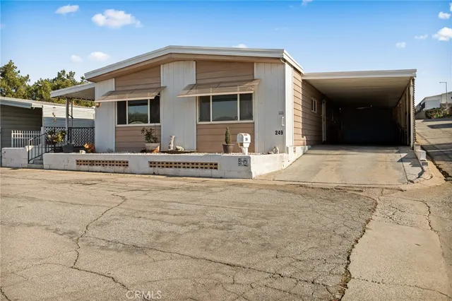 a front view of a house with a outdoor space