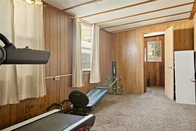 a room with a door and a window