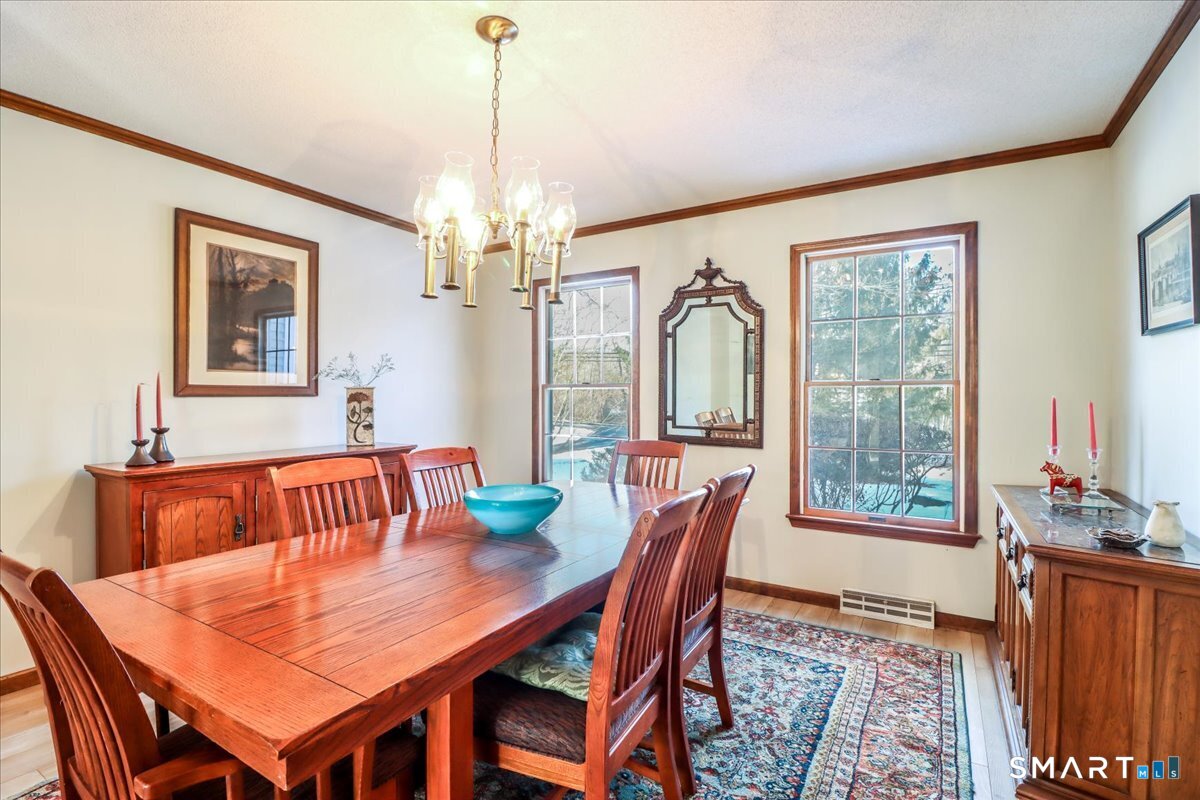 185 Quaker Farms Road Oxford, CT 06478 - Photo 3 of 40 a view of a dining room with furniture window and outside view