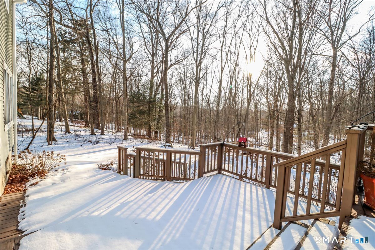 185 Quaker Farms Road Oxford, CT 06478 - Photo 32 of 40 a view of outdoor space with deck and trees