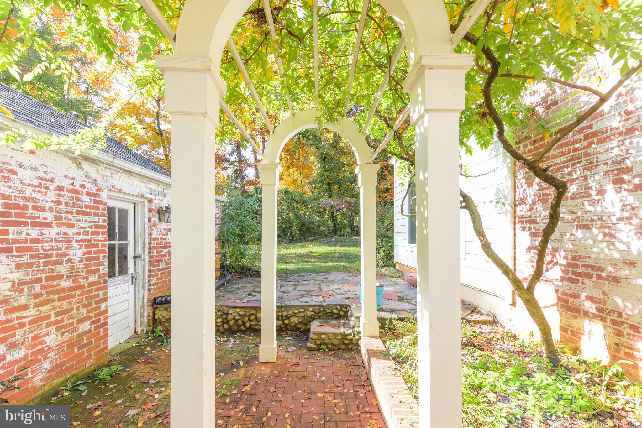 5954 Wilton Road Alexandria, VA 22310 - Photo 2 of 49 Portico between the carriage house garage and home