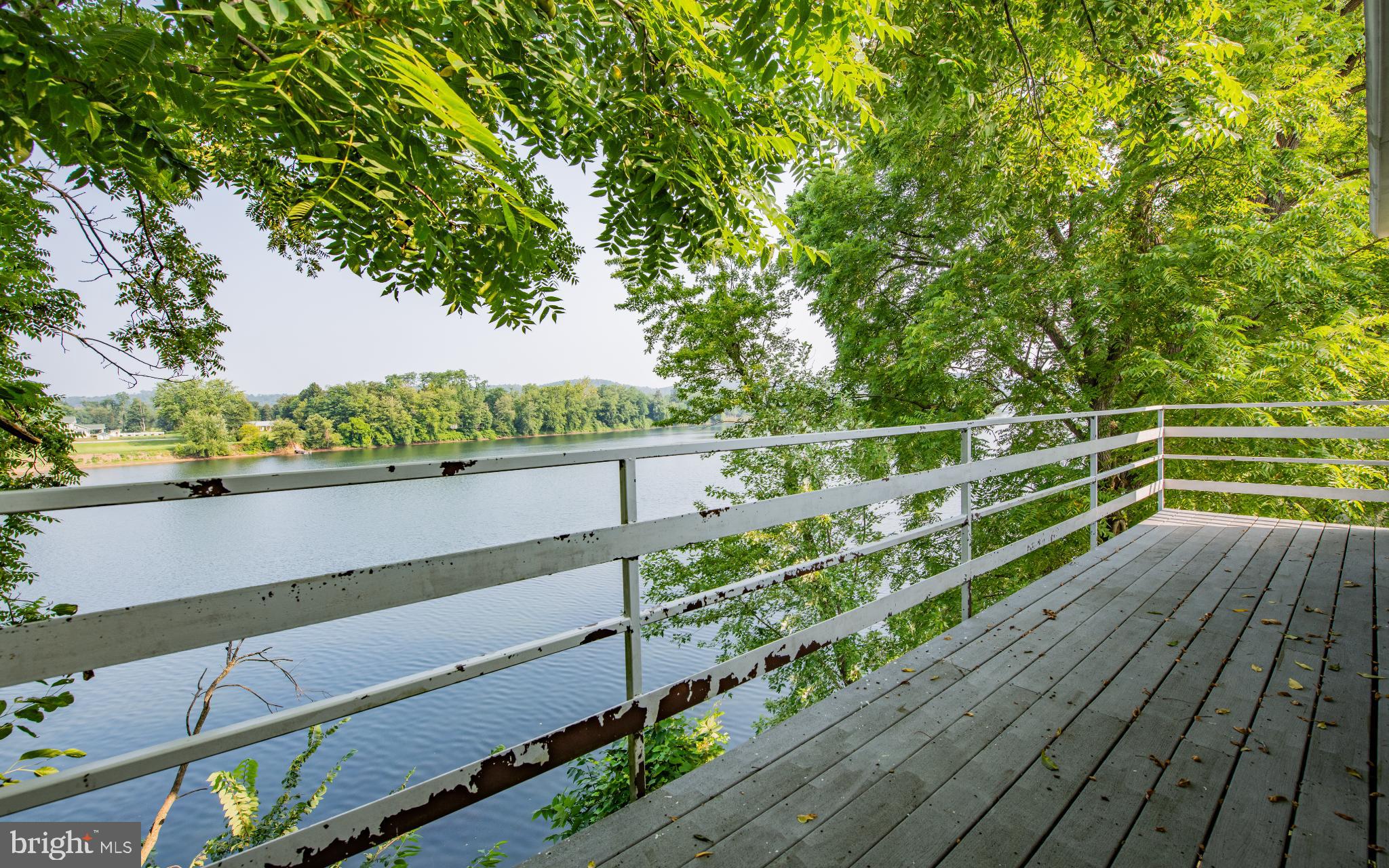 414 Big Run Road Williamsport, PA 17702 - Photo 20 of 22 a view of a balcony with wooden floor and fence