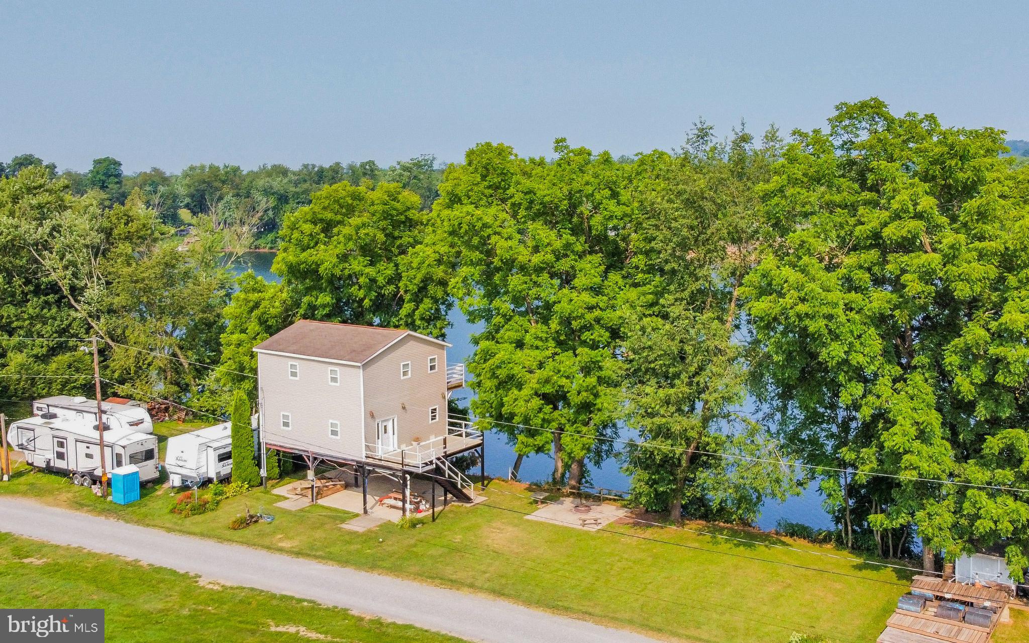 414 Big Run Road Williamsport, PA 17702 - Photo 4 of 22 an aerial view of a house with yard swimming pool and outdoor seating