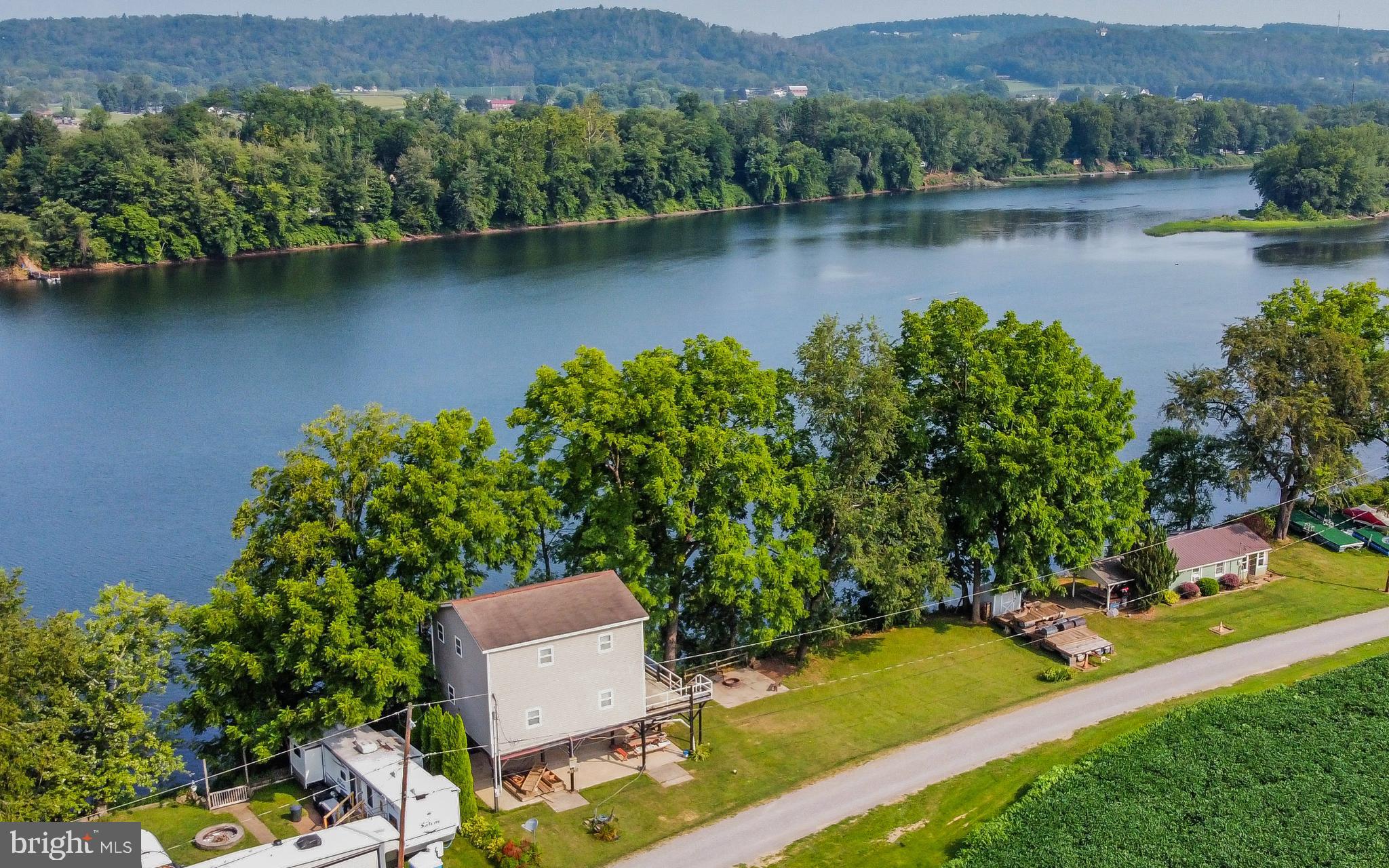 414 Big Run Road Williamsport, PA 17702 - Photo 6 of 22 an aerial view of a house with a lake view