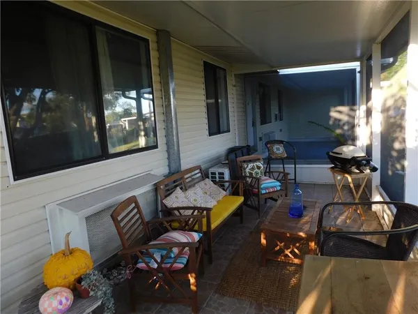 a room with furniture and gym equipment