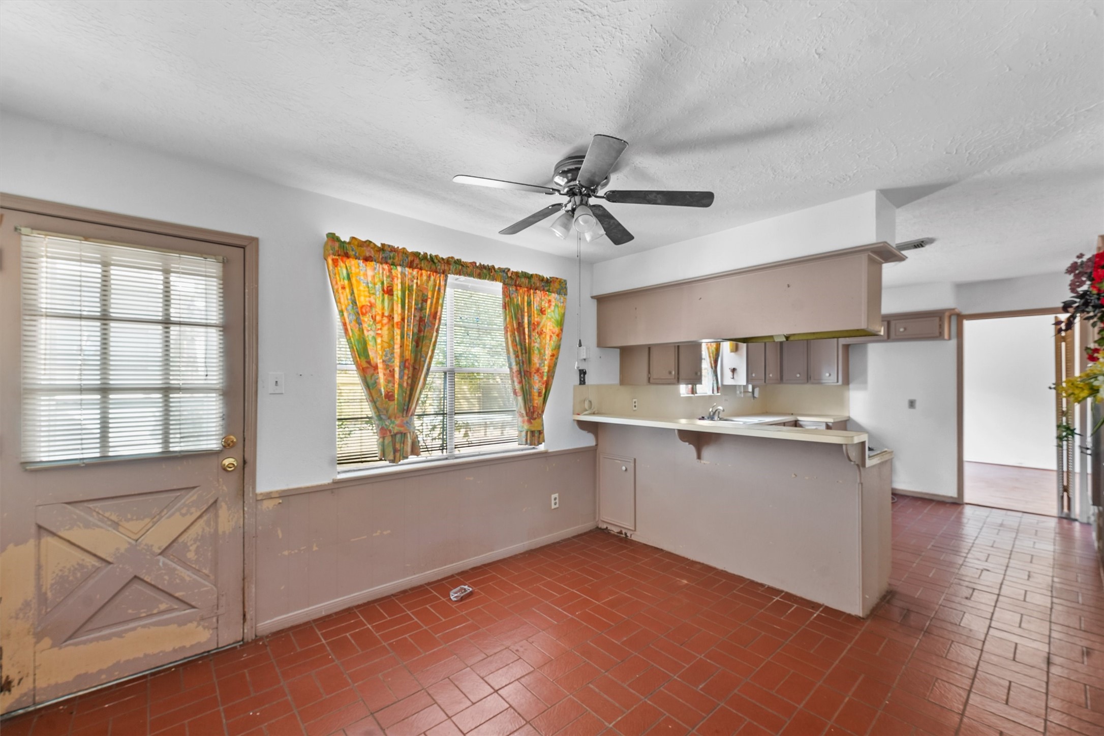 3930 Cypress Hill Drive Spring, TX 77388 - Photo 11 of 29 a kitchen with stainless steel appliances granite countertop a stove and a sink with cabinets