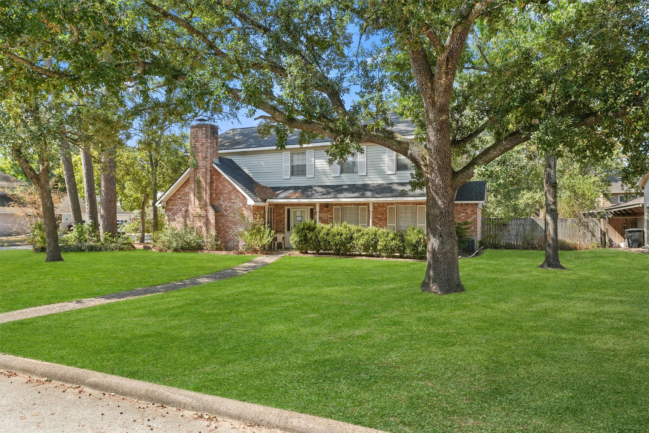 3930 Cypress Hill Drive Spring, TX 77388 - Photo 2 of 29 a front view of house with a garden