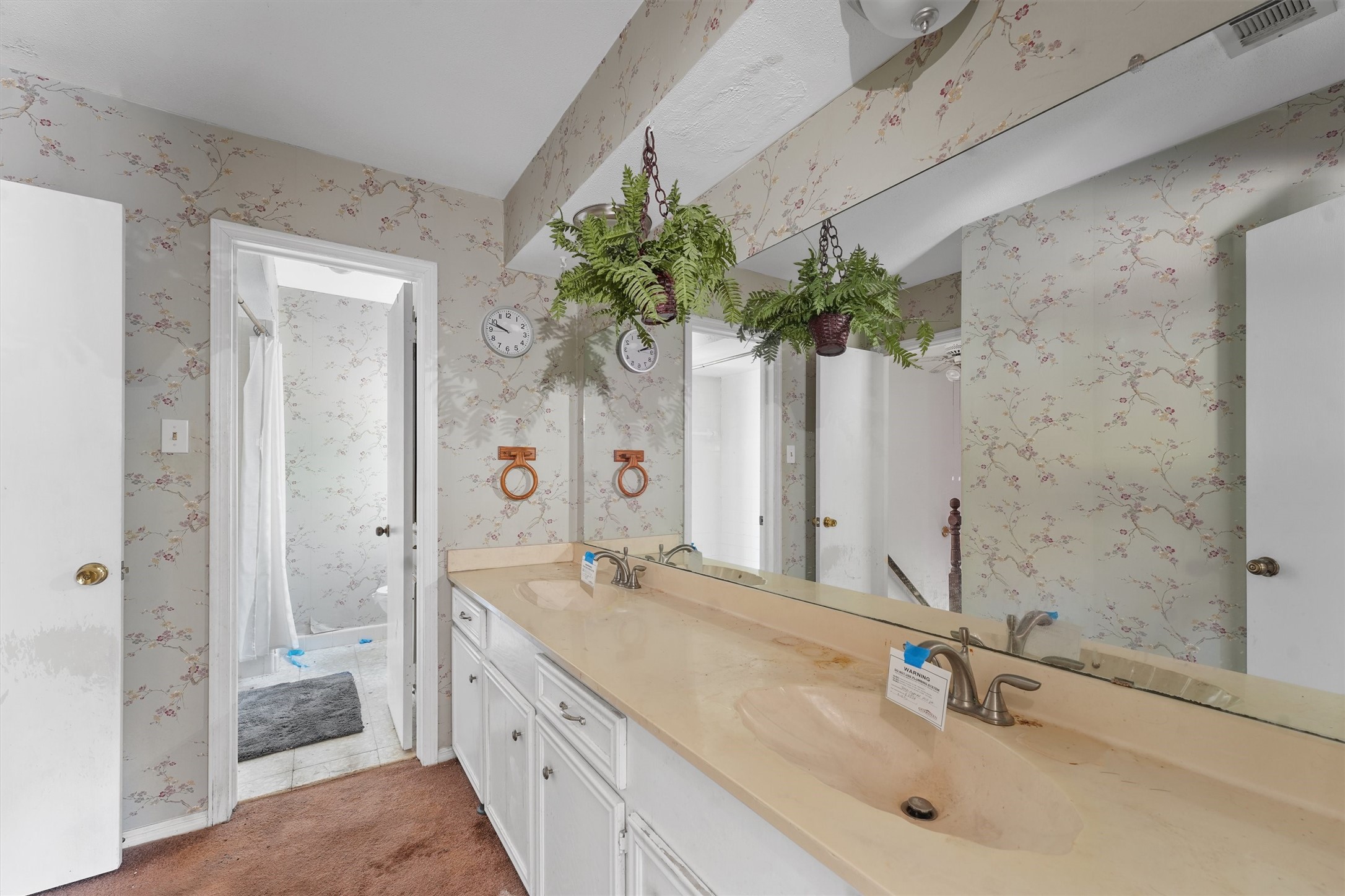3930 Cypress Hill Drive Spring, TX 77388 - Photo 24 of 29 a bathroom with a granite countertop sink a mirror and a shower