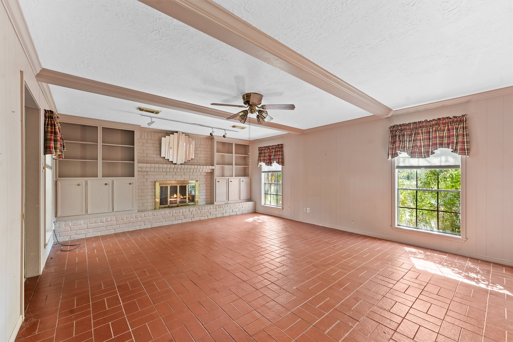 3930 Cypress Hill Drive Spring, TX 77388 - Photo 5 of 29 a view of an empty room with a window and wooden floor