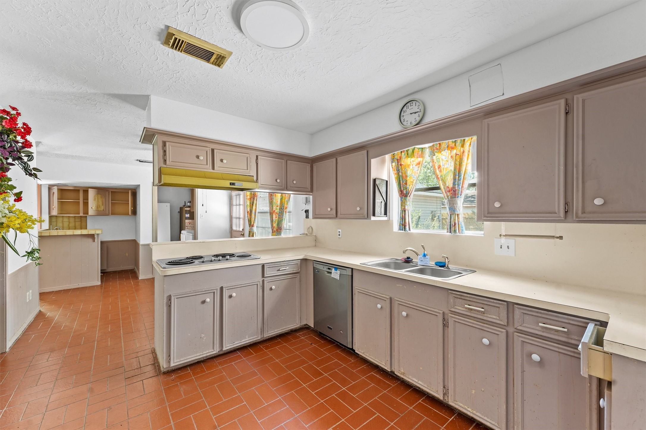 3930 Cypress Hill Drive Spring, TX 77388 - Photo 8 of 29 a kitchen with a sink stove and cabinets