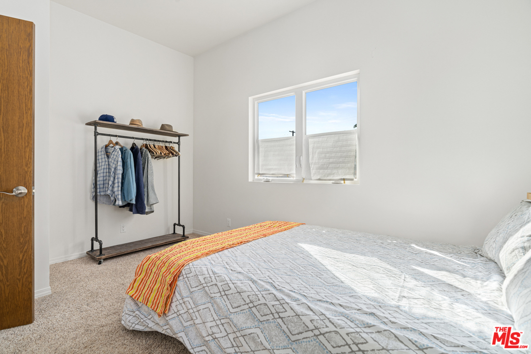 2275 Ewing Street Los Angeles, CA 90039 - Photo 12 of 19 a bedroom with a bed and dresser