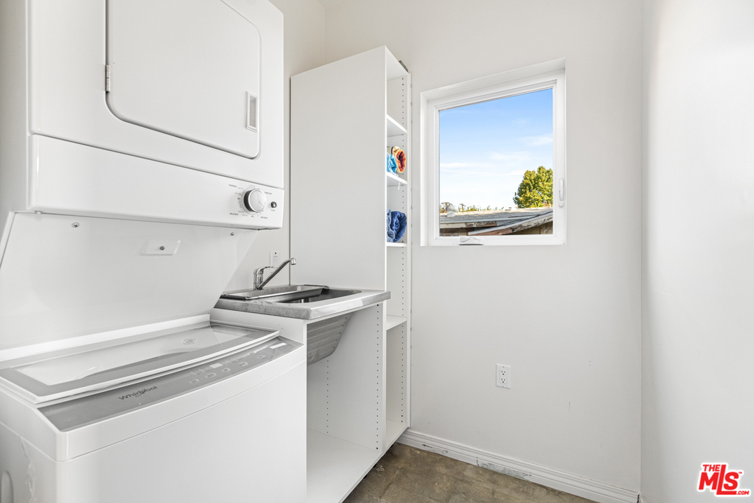 2275 Ewing Street Los Angeles, CA 90039 - Photo 15 of 19 a utility room with dryer and washer