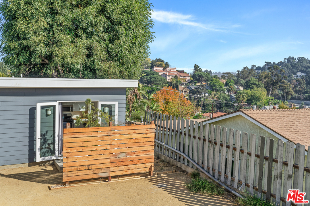 2275 Ewing Street Los Angeles, CA 90039 - Photo 3 of 19 a view of a house with backyard and deck