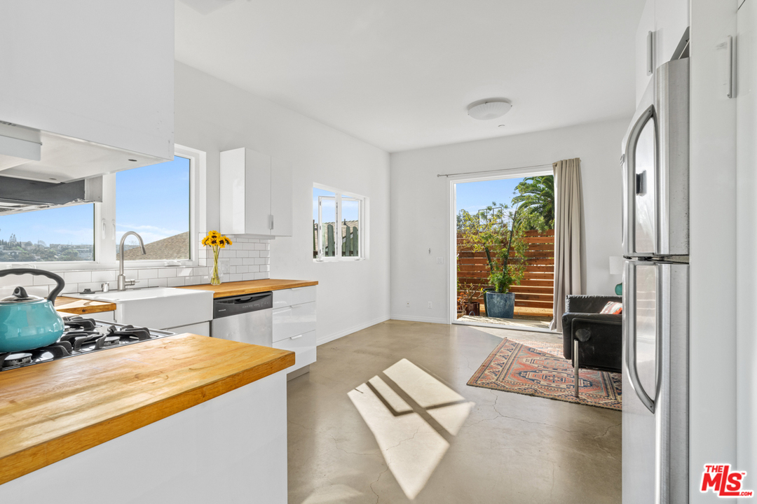 2275 Ewing Street Los Angeles, CA 90039 - Photo 10 of 19 a living room with furniture and a window