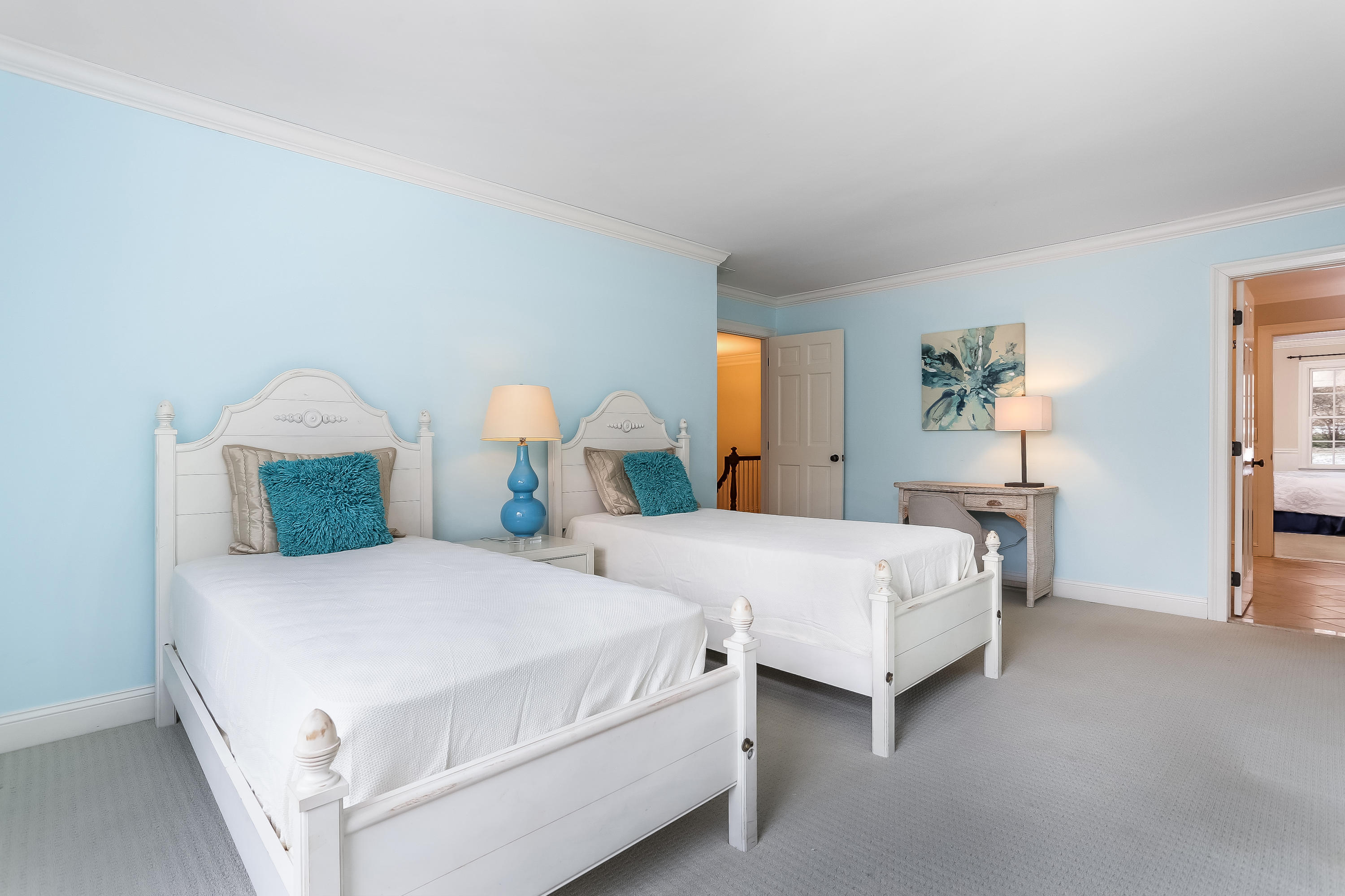 152 Marshall Ridge Road New Canaan, CT 06840 - Photo 23 of 34 a bedroom with two beds and painting on the wall