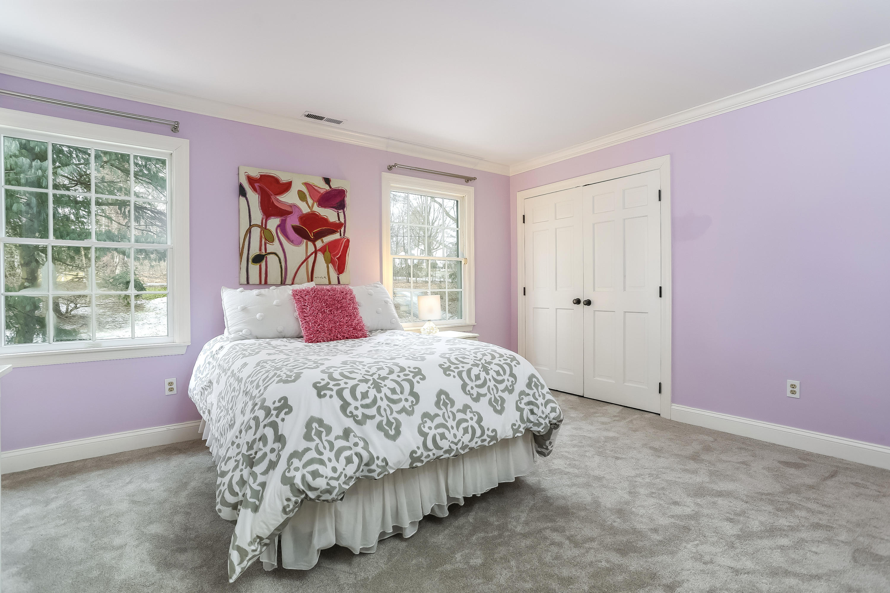 152 Marshall Ridge Road New Canaan, CT 06840 - Photo 27 of 34 a bedroom with a bed and a window