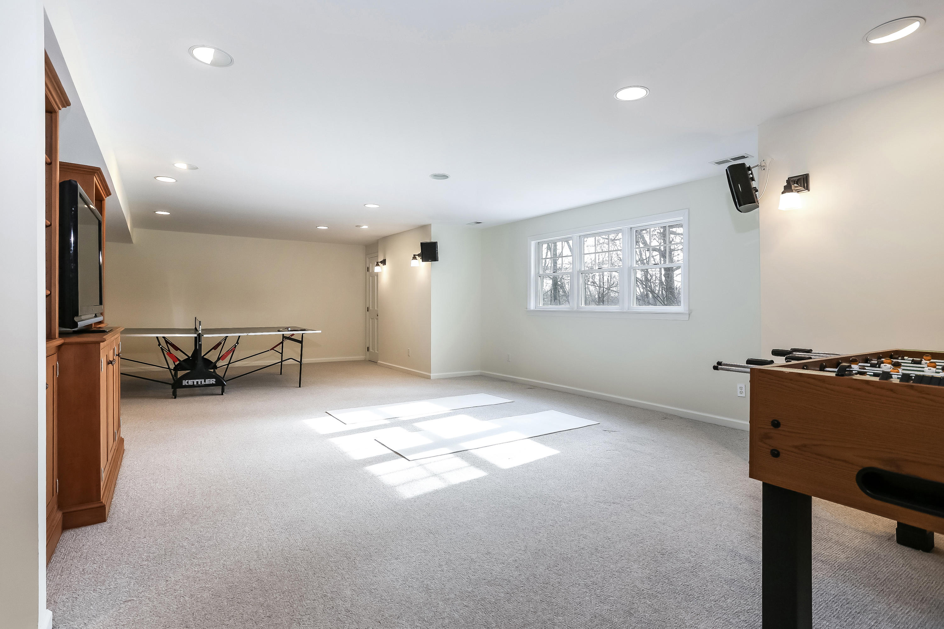 152 Marshall Ridge Road New Canaan, CT 06840 - Photo 28 of 34 a view of a workspace with furniture and a window