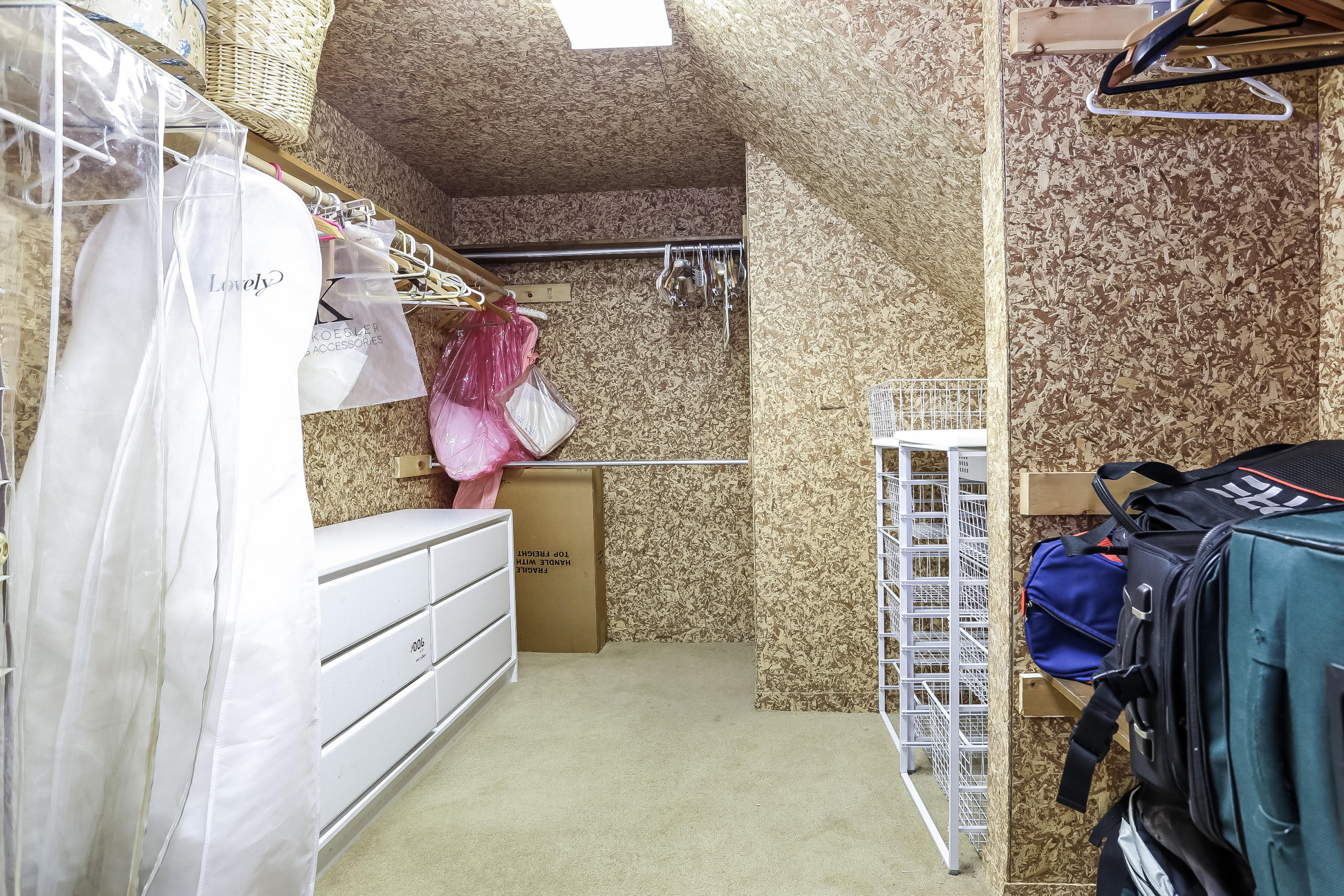 152 Marshall Ridge Road New Canaan, CT 06840 - Photo 29 of 34 a view of walk in closet with clothes