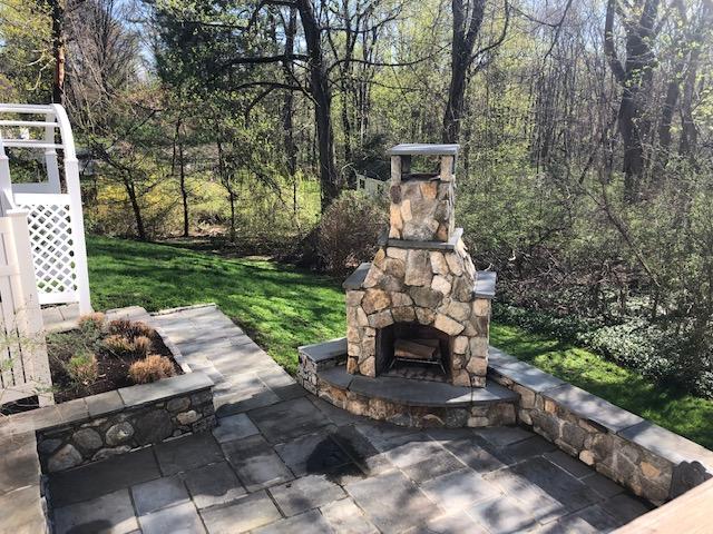 152 Marshall Ridge Road New Canaan, CT 06840 - Photo 31 of 34 a front view of a garden with patio
