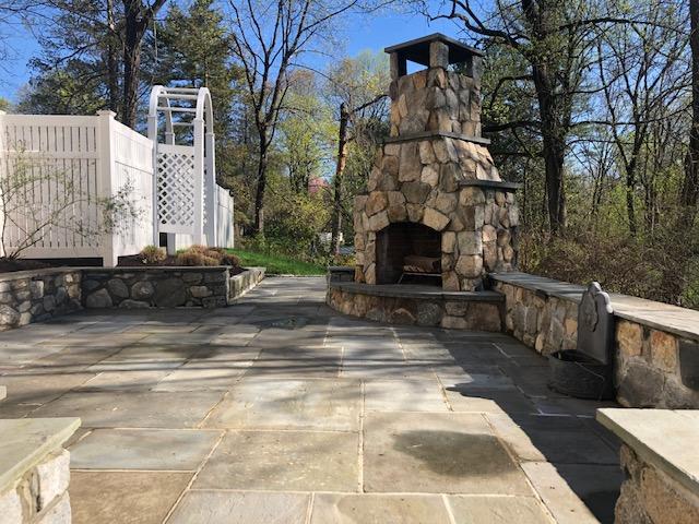 152 Marshall Ridge Road New Canaan, CT 06840 - Photo 32 of 34 a view of a backyard with sitting area