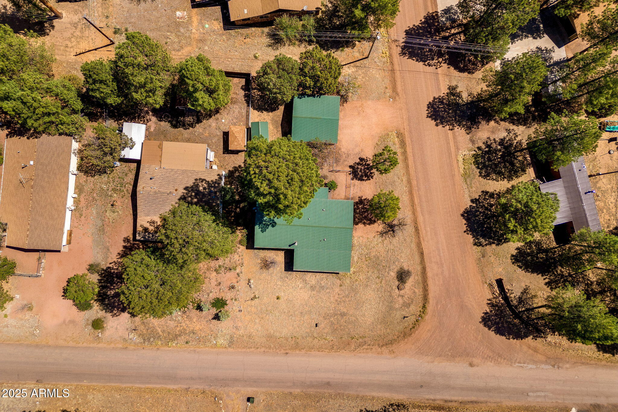 2841 Pine Rim Road Overgaard, AZ 85933 - Photo 30 of 36 an aerial view of a house with a yard