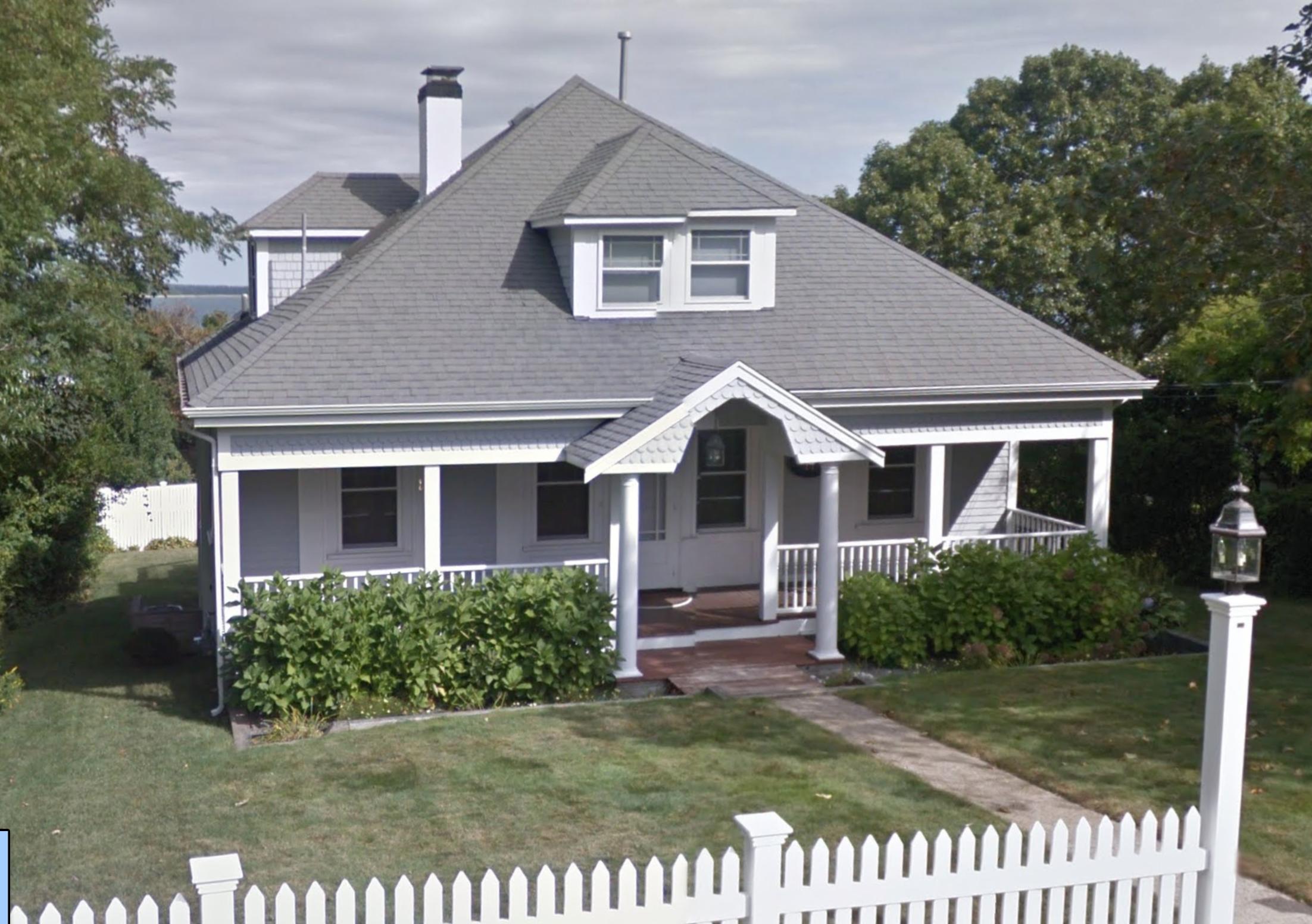 11 Hawes Road Sagamore Beach, MA 02562 - Photo 2 of 4 a front view of a house with a yard