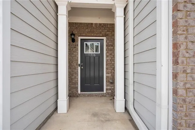 a view of front door with outdoor space