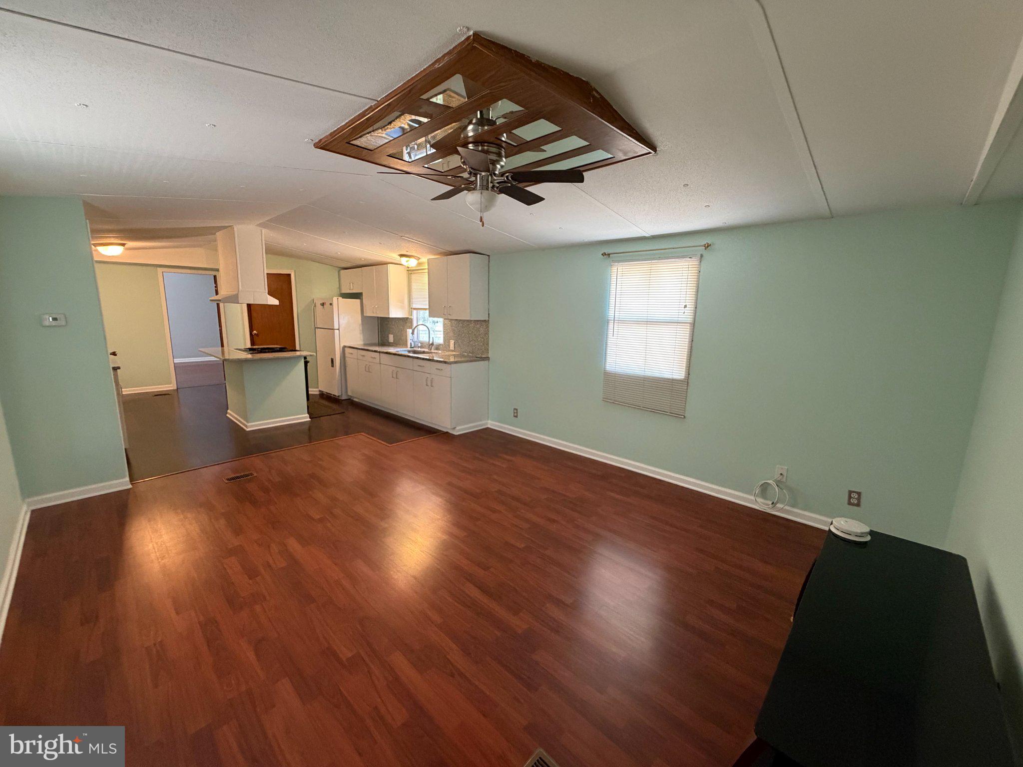 7923 Stork Road Alexandria, VA 22306 - Photo 5 of 17 Spacious living area with modern charm.