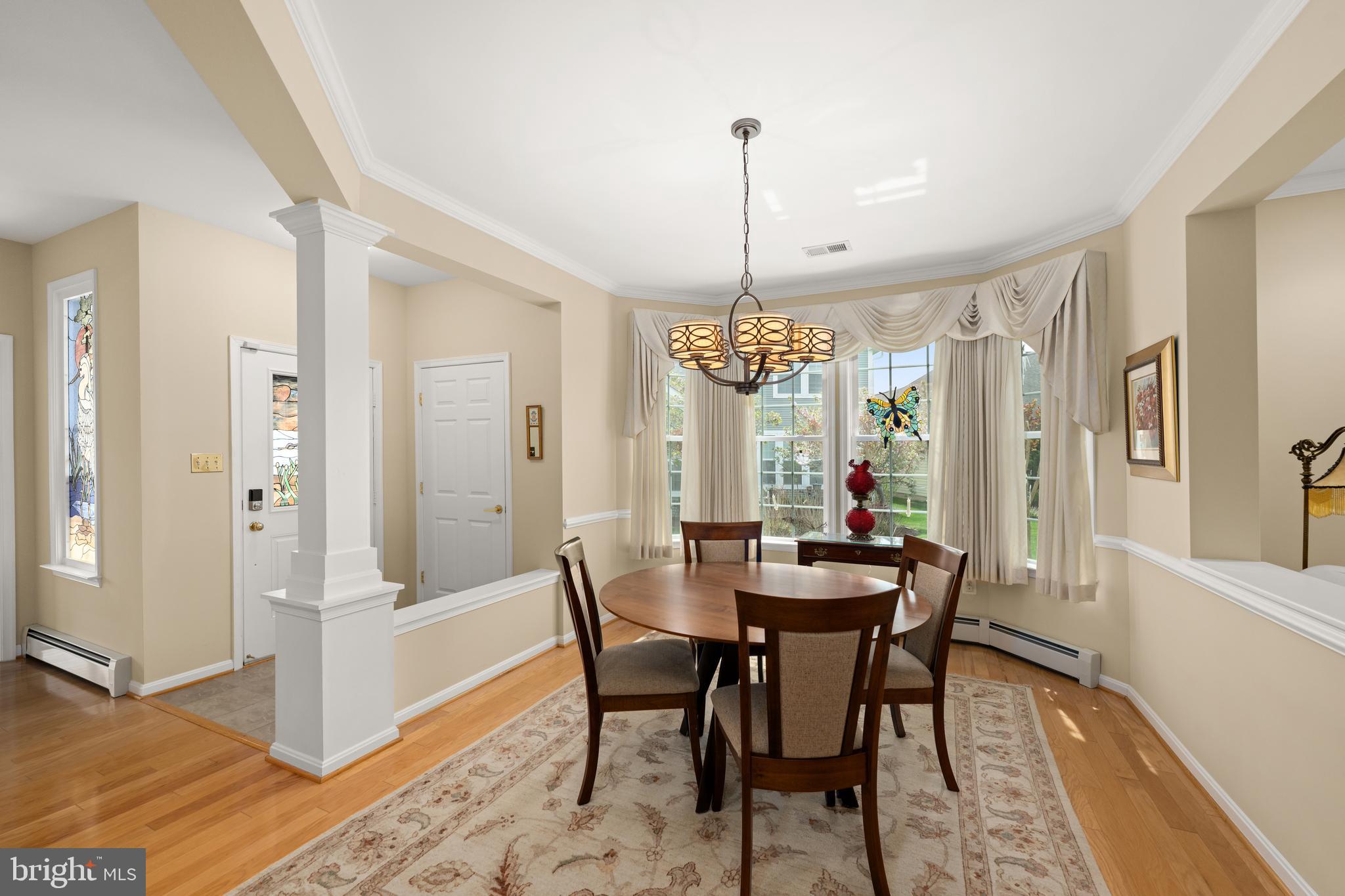152 Widgeon Way Bridgeville, DE 19933 - Photo 12 of 37 a view of a dining room with furniture window and wooden floor