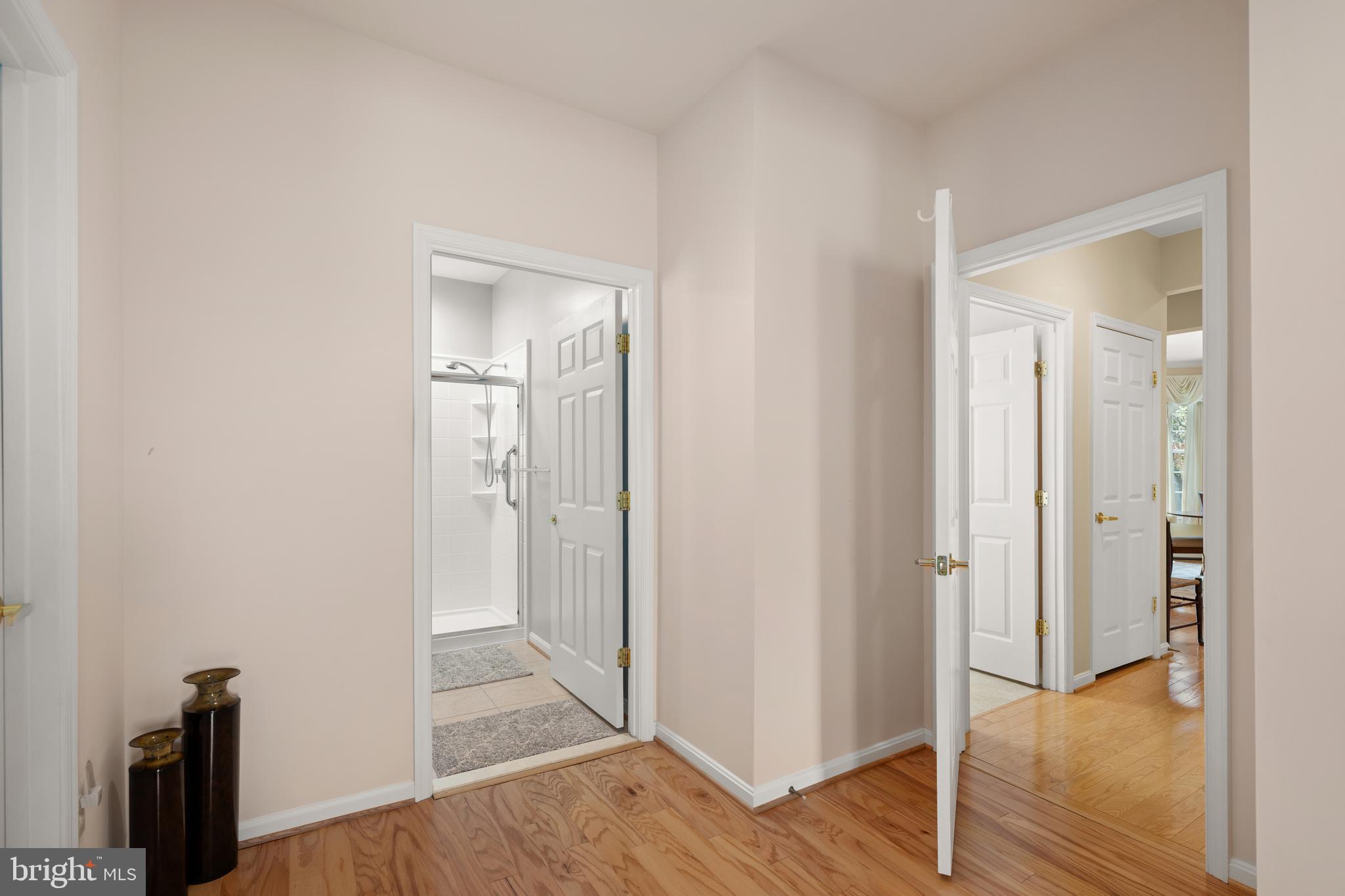 152 Widgeon Way Bridgeville, DE 19933 - Photo 17 of 37 a view of a hallway with wooden floor