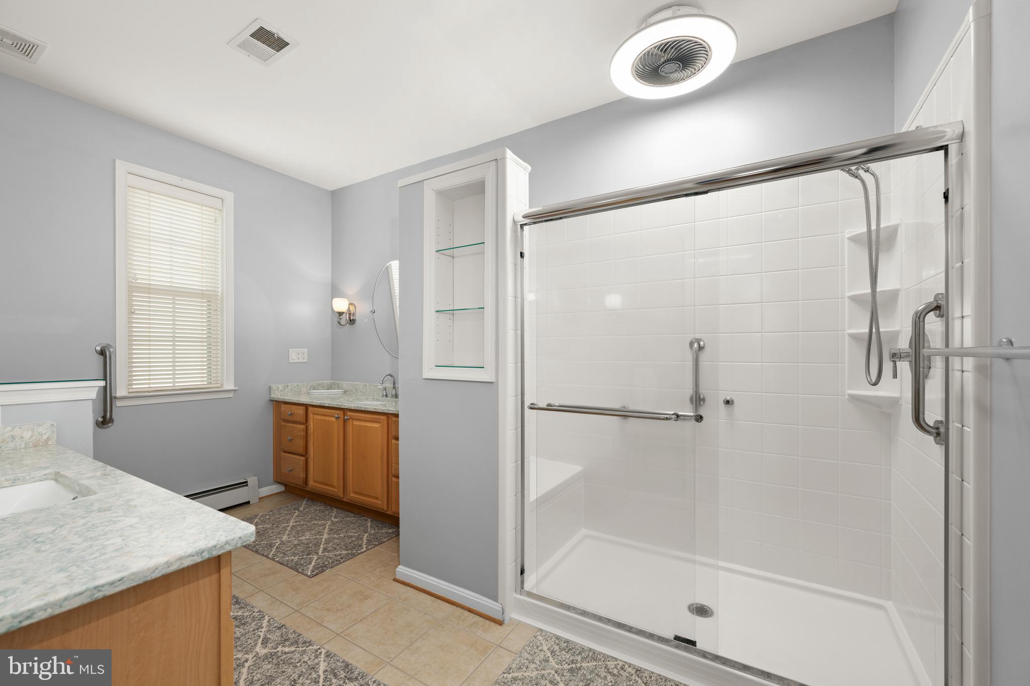 152 Widgeon Way Bridgeville, DE 19933 - Photo 19 of 37 a bathroom with a tub and shower