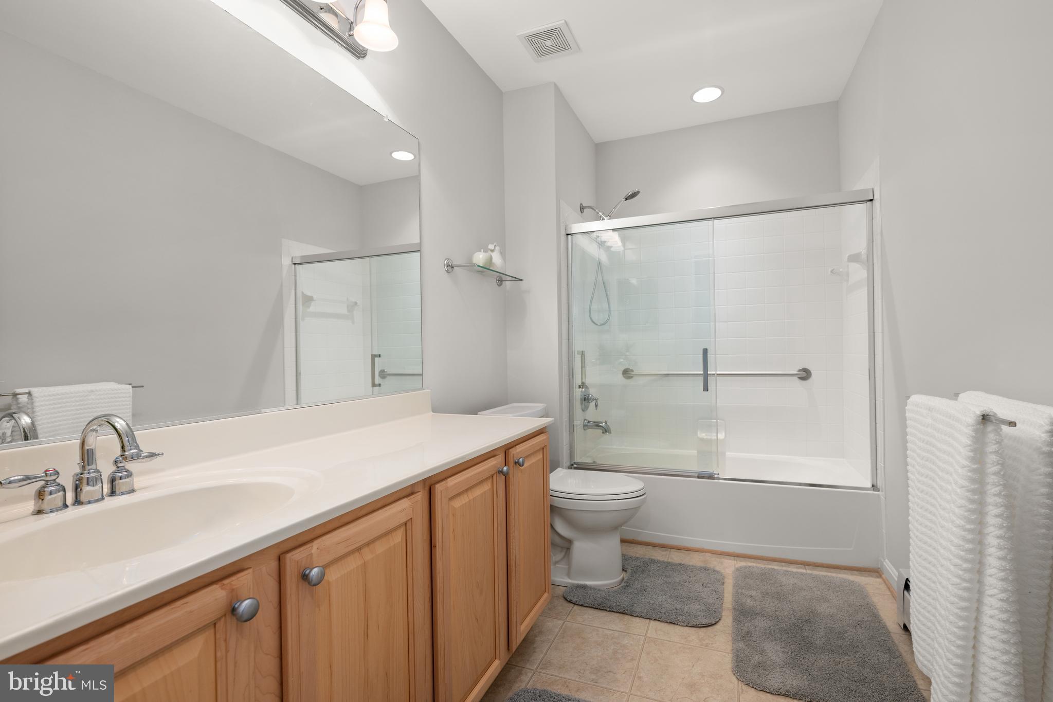 152 Widgeon Way Bridgeville, DE 19933 - Photo 28 of 37 a bathroom with a sink a toilet and shower
