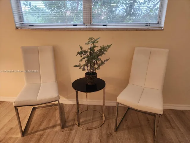 a vase of flowers sitting on a table