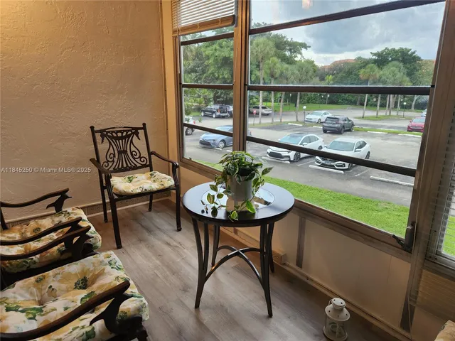 a room with furniture and a window